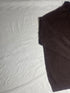 Close-up view of inner neck tag on vintage Nautica brown quarter-zip jumper showing size Large, 100 percent cotton label, and Made in Thailand tag