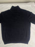 Flat lay view of vintage Nautica black quarter-zip jumper with contrast grey collar in size Extra Large